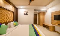 Treebo Golden Swan Pammalにあるベッド