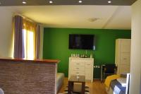 Televízia a/alebo spoločenská miestnosť v ubytovaní Studio Apartman PlanB, self CHECK IN