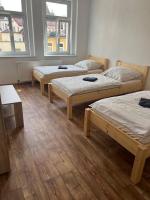Postel nebo postele na pokoji v ubytování Apartmány Zahradní