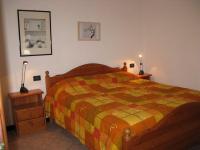 A bed or beds in a room at Agriturismo La Vigna