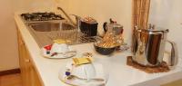 Zestaw do parzenia kawy i herbaty w obiekcie Appartamento Rialto Laura