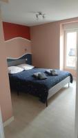 Posteľ alebo postele v izbe v ubytovaní MIMALELY - House & terrace