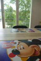 a table with a picture of mickey mouse on it at Disneyland Paris, appartement 70m², parking privé in Serris