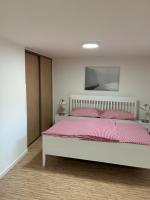Postel nebo postele na pokoji v ubytování Red Travel Apartment