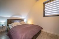 Posteľ alebo postele v izbe v ubytovaní MINIMAR Apartamenty Świeradów