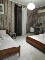 A bed or beds in a room at Hotel Efyra