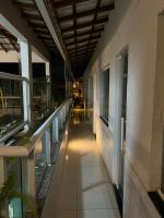 an empty hallway of a building with a balcony at Pousada Portico de Buzios in Armacao dos Buzios