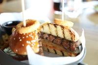 a sandwich and french fries in a container at Expoist Hotel in Beylikduzu