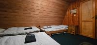 Postel nebo postele na pokoji v ubytování Chata Čenkovice