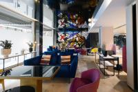 A seating area at voco Madrid Retiro by IHG