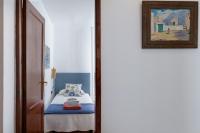 Postel nebo postele na pokoji v ubytování Famara Caracolillos, La Casa