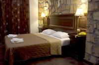A bed or beds in a room at Iris Spa