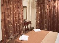 A bed or beds in a room at Iris Spa