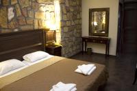 A bed or beds in a room at Iris Spa