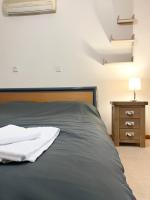 Postel nebo postele na pokoji v ubytování 212 Apartment, A 2-bedroom escape