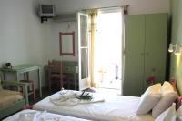 Posteľ alebo postele v izbe v ubytovaní Villas Georgy
