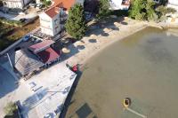 an overhead view of a pool of water with a boat at Apartments by the sea Kraj, Pasman - 3460 in Pašman
