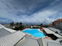 an aerial view of a resort with a swimming pool at Hôtel Exsel Créolia in Saint-Denis