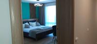 Postel nebo postele na pokoji v ubytování Apartmenthaus Oborishte