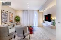 TV a/nebo společenská místnost v ubytování Prime Residence Sheikh Zayed