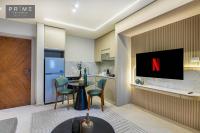 TV a/nebo společenská místnost v ubytování Prime Residence Sheikh Zayed