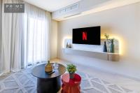 TV a/nebo společenská místnost v ubytování Prime Residence Sheikh Zayed