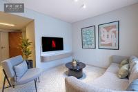 TV a/nebo společenská místnost v ubytování Prime Residence Sheikh Zayed