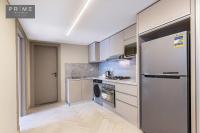 Kuchyň nebo kuchyňský kout v ubytování Prime Residence Sheikh Zayed