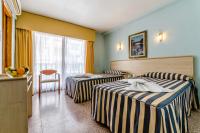 Postel nebo postele na pokoji v ubytování Hotel Mediterráneo