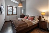 Posteľ alebo postele v izbe v ubytovaní Apartamenty City Center - Zdrojowe