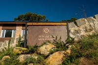a sign for the university of australiana at Jangal das Araucárias Swan Design Hotel Canela in Canela