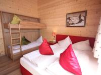 Łóżko lub łóżka w pokoju w obiekcie Kaprun Lodge - R