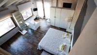 A television and/or entertainment centre at Casa Rural La Chocolateria