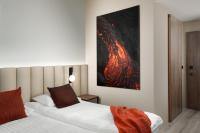 Postel nebo postele na pokoji v ubytování Hotel Klaustur