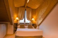A bed or beds in a room at Turin Sweet Home