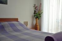 Posteľ alebo postele v izbe v ubytovaní Apartments Mistral