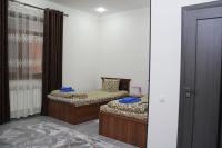 Chinara Guest House Airportにあるベッド