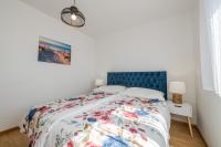 Posteľ alebo postele v izbe v ubytovaní Sun Island Apartment