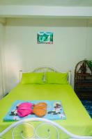 Postel nebo postele na pokoji v ubytování TAMONWAN HOUSE Koh Tao