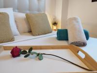 Łóżko lub łóżka w pokoju w obiekcie My Suites Madrid - Aeropuerto Ifema