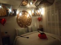 Łóżko lub łóżka w pokoju w obiekcie La loveroom de l'Artois