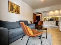 A seating area at Apartment Harmony - Tatranska Lomnica, Javorinka