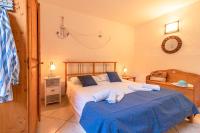 Posteľ alebo postele v izbe v ubytovaní Appartamenti in Villa De Santis a Gallipoli
