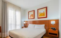 Postel nebo postele na pokoji v ubytování Hotel Palacios