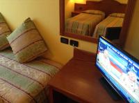 Televízia a/alebo spoločenská miestnosť v ubytovaní Hotel Cinzia Ristorante Christian e Manuel