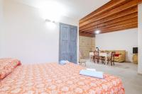 Posteľ alebo postele v izbe v ubytovaní Villa Fuggiacune con piscina privata
