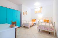 Posteľ alebo postele v izbe v ubytovaní Villa Fuggiacune con piscina privata