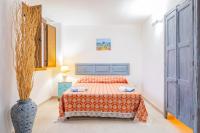 Posteľ alebo postele v izbe v ubytovaní Villa Fuggiacune con piscina privata
