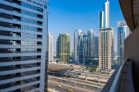 Nespecifikovaný výhled na destinaci Dubaj nebo výhled na město při pohledu z apartmánu