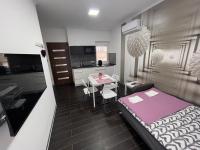 Posteľ alebo postele v izbe v ubytovaní Sweet Home Apartman